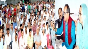 Deputy Chief Minister Nirmal Singh addressing public meeting in Kathua district on Friday.