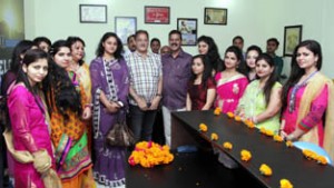 Speaker Legislative Assembly Kavinder Gupta posing for photograph at the inauguration of JMK Corporate Office.