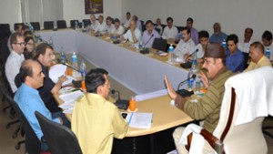 Minister for Law, Syed Basharat Bukhari chairing a meeting at Jammu on Saturday.  