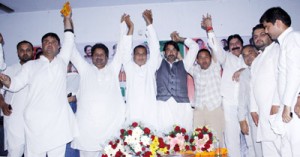 PCC chief GA Mir flanked by senior leaders during party convention in Jammu East on Thursday.   	   —Excelsior/Rakesh