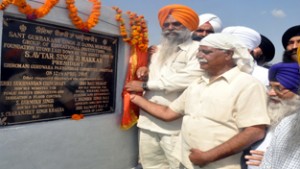 Minister for PHE, Sukhnandan Chowdhary laying foundation stone of Sant Gurubaksh Singh Danna Memorial Group of  Institutions at Jammu on Sunday.