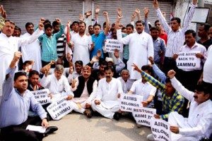 JKNPP leaders and activists during a sit-in protest outside Press Club, Jammu on Wednesday.