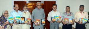 Governor N N Vohra and others releasing a book “Dogri Ekanki” on Thursday.