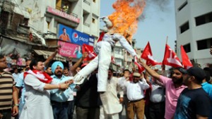 Youth NC activists staging protest against new recruitment policy in Jammu on Tuesday. 