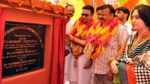 Minister for CA&PD, Choudhary Zulfkar Ali and Minister for Industries Chander Prakash Ganga laying foundation stone of Gujjar & Bakerwal hostel at Samba on Tuesday.