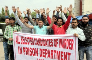 Protestors raising slogans during demonstration at Jammu on Monday.-Excelsior/Rakesh	