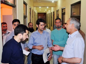 Minister for Hajj, Abdul Rehman Veeri interacting with Auqaf authorities at Jammu on Monday. 