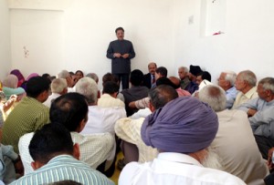 Gulchain Singh Charak addressing party workers during one day convention at Bishnah.
