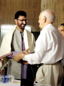 BJP MLC Surinder Ambardar being felicitated by Dr K.N Pandita president JKNM on Sunday.