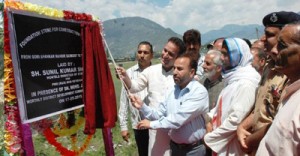 Minister of State for PWD, Sunil Sharma laying foundation stone of link road at Kishtwar on Sunday. 