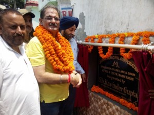 Speaker Legislative Assembly, Kavinder Gupta laying foundation stone of lanes and drains on Sunday. 