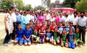 Winners of various titles posing along with chief guest and other dignitaries at GHSS Domana in Jammu on Saturday.  