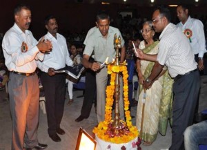 Dignitaries lighting the ceremonial lamp while inaugurating talent hunt show at Air Force Station in Jammu.