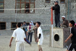 An iron tank being used as an official table during a volleyball match at GHSS Leh.