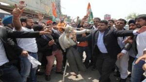 PYC activists staging protest against Modi Govt in Jammu on Tuesday. —Excelsior / Rakesh