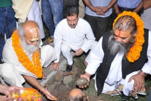 Saints laying foundation stone of HSS at Tawi Island.