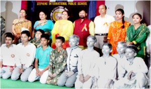 Students posing alongwith Minister for Health and Medical Education and other dignitaries during Cultural-Cum-Variety Show at Stephens Public School, Miran Sahib in Jammu.   