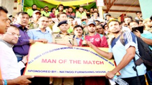 POC Bangladesh player receiving man of the match award from the chief guest in Doda on Friday.
