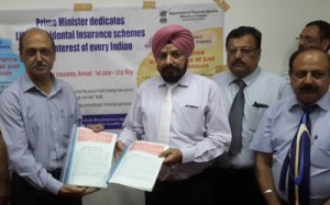 LIC of India and JCC Bank officers after signing MoU at Sehkari Bhawan on Thursday.