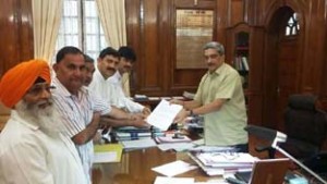 BJP delegation submitting a memorandum to Union Defence Minister, Manohar Parikar at New Delhi on Wednesday.