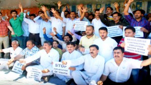 NPP leaders and party activists staging protest in Jammu on Friday.        -Excelsior/Rakesh