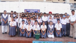 Meritorious students of APS Akhnoor posing for a group photograph along with School Principal, KCS Mehta and other dignitaries during a felicitation function on Wednesday.