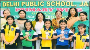 Winners of English Recitation posing for a group photograph alongwith dignitaries at DPS Jammu.