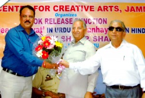 MLA Akhnoor, Rajiv Sharma alongwith others during a book release function.