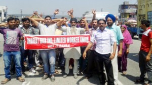 Workers of Bharat Box Factory raising slogans during demonstration at Samba.—Excelsior/Gautam