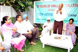 A senior artist and writer, N D Jamwal, addressing the gathering during the concluding day of artists’ camp at Jammu.