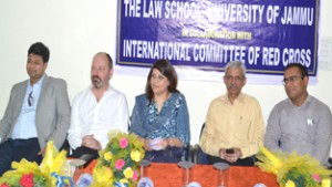 Resource person and others on dais during a workshop at JU Law School on Thursday.