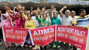 Protestors raising slogans during demonstration at Jammu on Sunday. -Excelsior/Rakesh