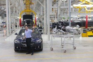 Legendary cricketer Sachin Tendulkar posing with BMW 5 Series at Channai.