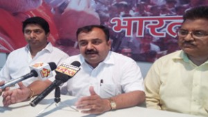 BJP leaders at a press conference at Jammu on Sunday. 