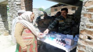 An elderly lady is receiving medicines during medical camp on Sunday.