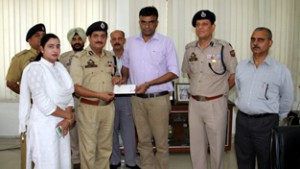 DIG Shakeel Ahmed Beig being given warm send off on his superannuation at Range Police Headquarters on Saturday.