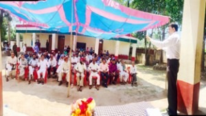 MLC Vibodh Gupta addressing a function at Keeri Doongi in Rajouri district on Sunday.-Excelsior/ Bhat