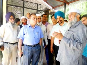 Deputy Chairman, Legislative Council, Jahangir Hussain Mir during visit to a school on Wednesday.