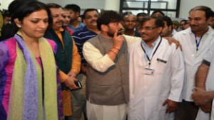 Minister for Health, Ch Lal Singh interacting with staff at District Hospital, Reasi.