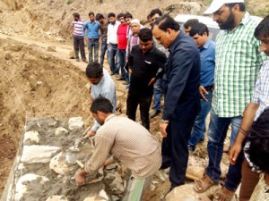 MLA Inderwal GM Saroori inspecting road project in Sub-Division Thathri.