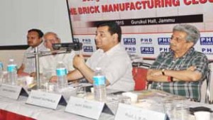 Director Industries Abdul Rashid addressing a seminar on brick design on Friday.