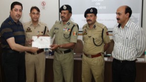 Senior police officers during the valedictory ceremony of 3-day e-governance course for DDOs of police at Udhampur on Friday.