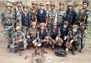 Troops pose with recovery at Panasa, Arnas in Reasi district on Sunday.