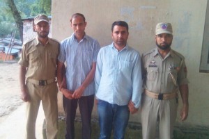 JK Bank clerk and BGSBU employee arrested by police in Scholarship scam in Rajouri.— Excelsior/Bhat