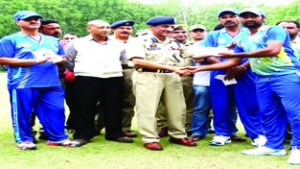 Dignitaries awarding winners of quaterfinal match of PPCPL at Srinagar on Monday.