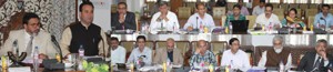 Minister for R&B, Syed Mohammad Altaf Bukhari alongwith MoS for R&B Sunil Sharma presiding over 89th meeting of Board of Directors of JKPCC at Srinagar on Monday.