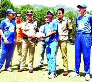 DIG Traffic Alok Kumar awarding a player during PPCPL at Srinagar on Tuesday.