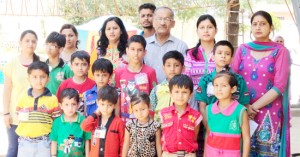 Winners of Sport climbing event posing for group photograph.