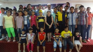 Participants of Guitar Clinic posing for group photograph alongwith chief guest MLA Jammu East Rajesh Gupta and Secretary IRCS, RC Puri.