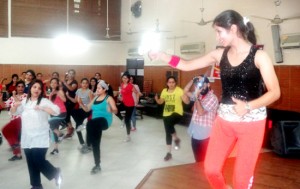 Participants during Live Zumba Fitness Concert at Jammu on Saturday.